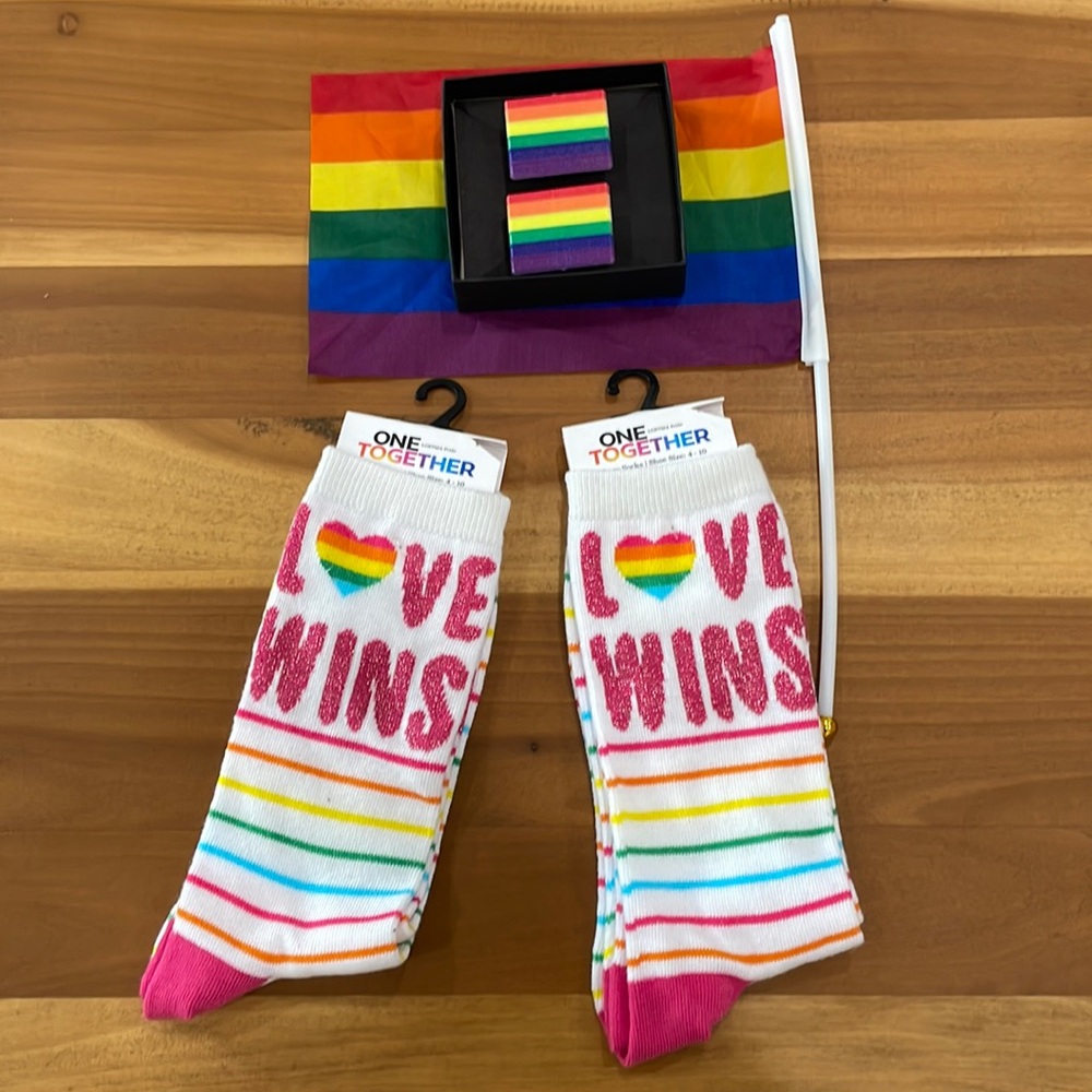 Its a date! Happy Pride with matching rainbow socks and rings!